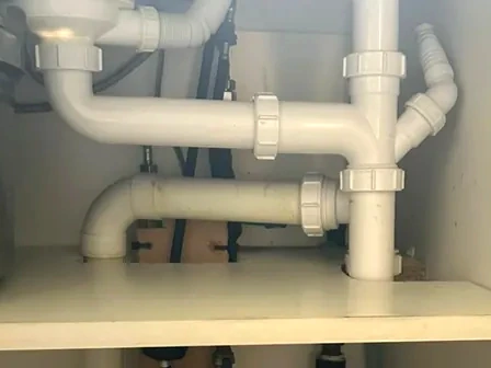 Completed under-sink pipework by Flow Right Plumbing in Ashford.